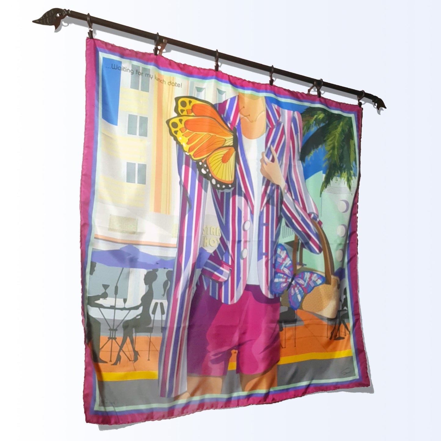 Bold colors silk scarf hanging on a pole as wall art or tapestry